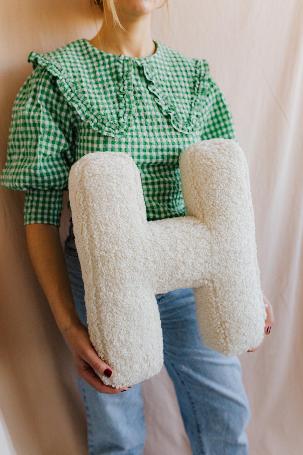 boucle letter cushion H teddy pillow by bettys home held by mom on mom day gift idea