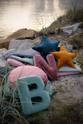 large floor pouf by bettys home and velvet letter cushion b mint on beach 