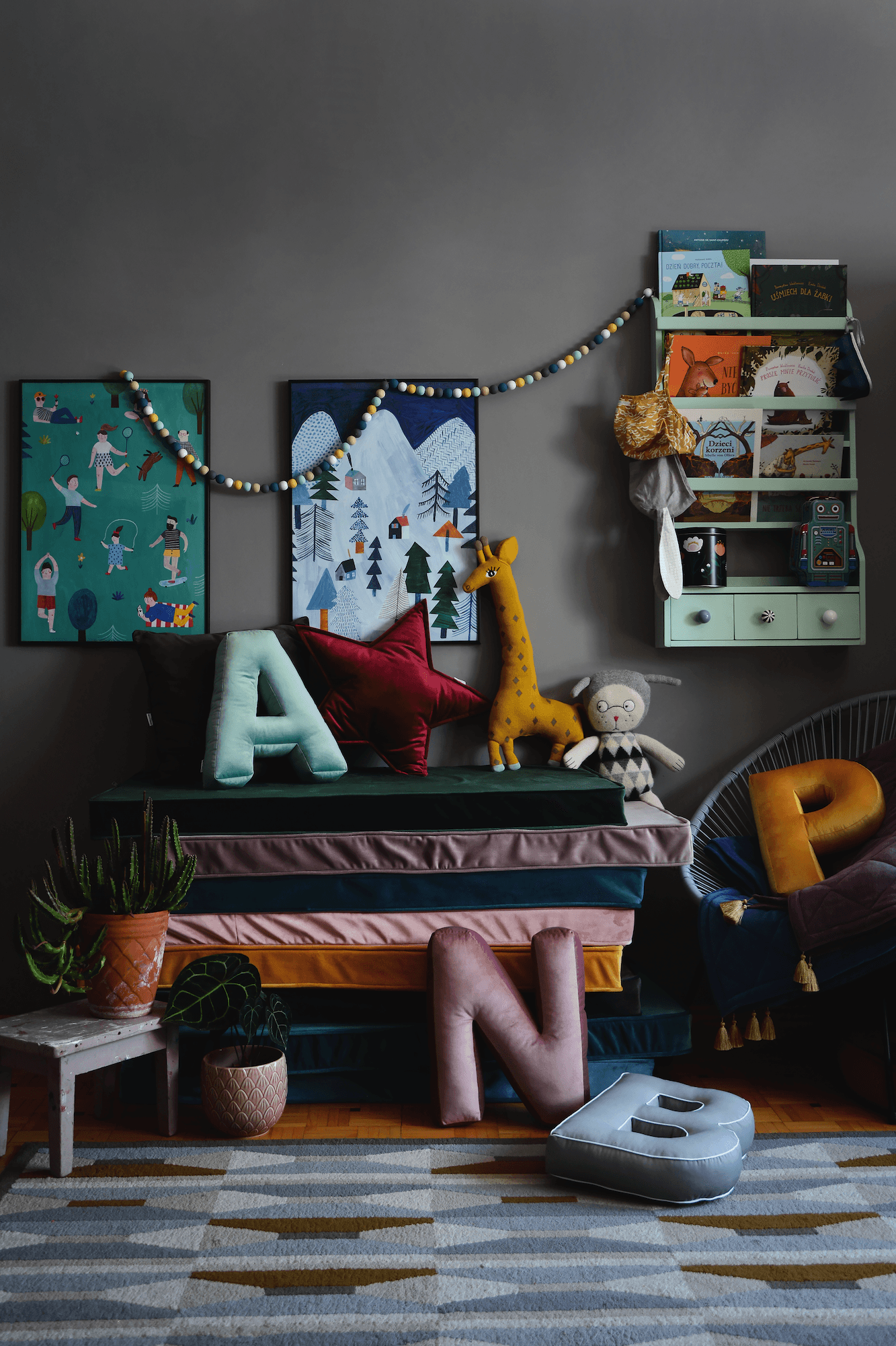 kindergarten kids room with velvet mattresses and velvet letter shaped cushions by bettys home