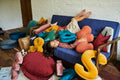 kids room with lot of letter pillows by bettys home