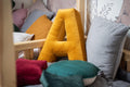 bed decoration in shaped of letter pillow a yellow by betty's home